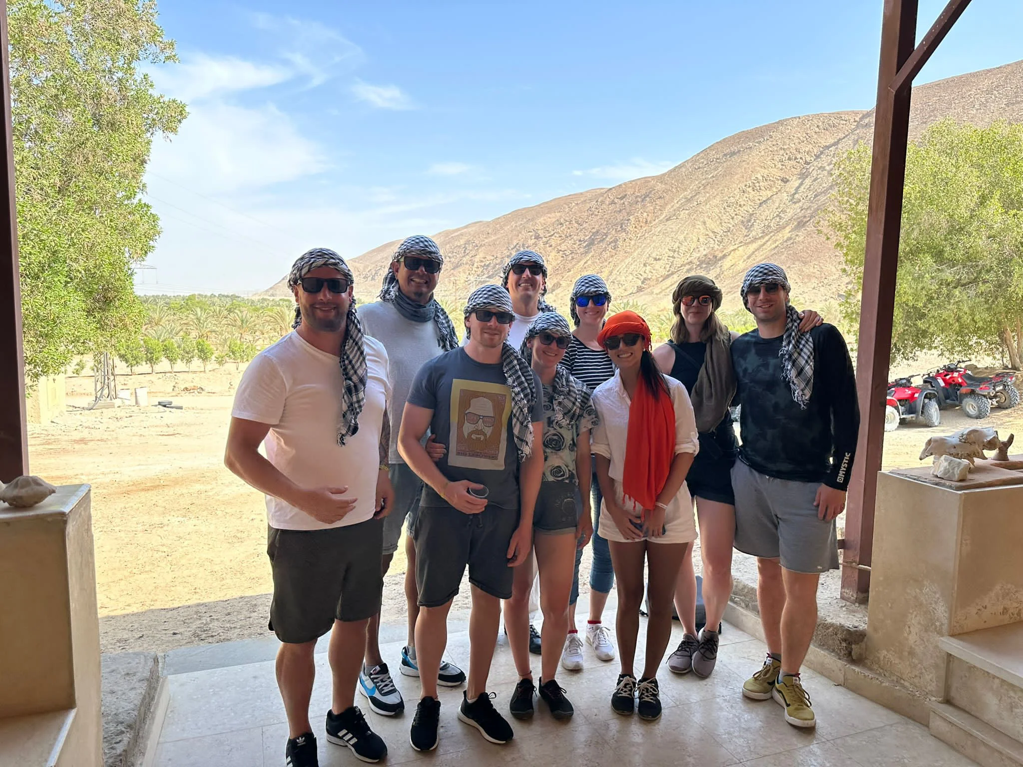 Kitesurfing camp with people learning and riding kites